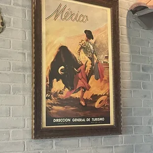 a bull and a man on horseback