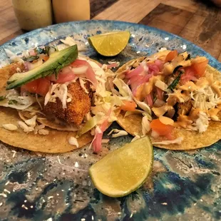 Breaded fish and blackened fish tacos.