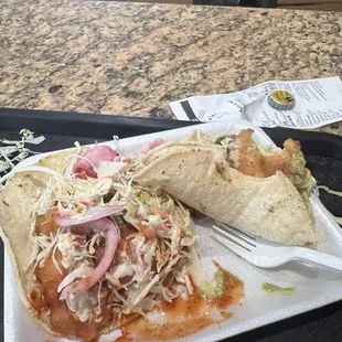 Two Fish Tacos that I doctored the heck up!! Delicious crunch!