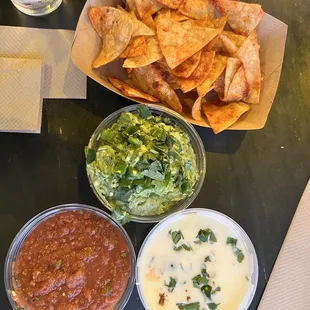 Pick 3 Guacamole, Queso, Salsa Roja and Chips.   Homemade chips and all sides where really good!