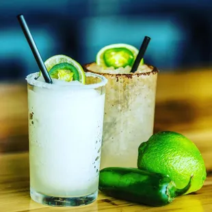 two cocktails on a table