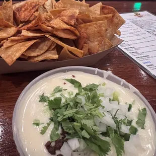 Chips and queso (added onion)