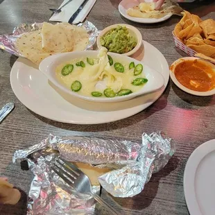 Appetizer queso fondido and guacamole