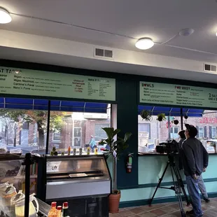 a man standing in front of a counter