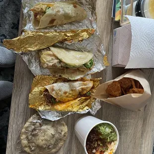 Nano taco (top), migas taco (middle), build your own taco (bottom), chorizo queso with puffy chips, and praline cookie.