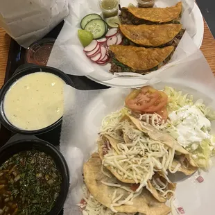 Chips and cheese dip, quesa-tacos and fried tacos with ground beef.  So good!