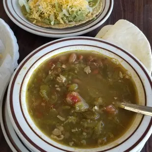 Bowl of green chili &amp; guacamole tostada