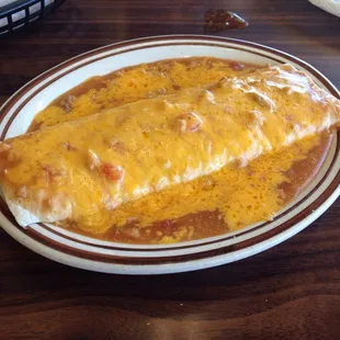 Bean burrito smothered with green chili and cheese