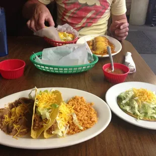 Dinner - tacos, burrata (bean burrito smothered in enchilada sauce) and a guacamole tostada.