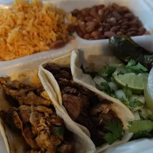 Taco plate with lengua and spicy chicken.