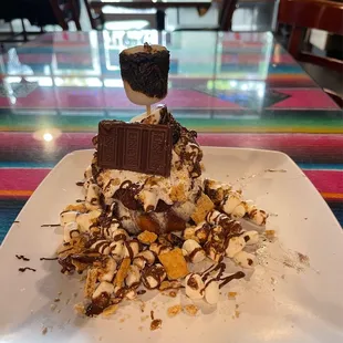 The free churro dessert with Yelp check-in that can easily be shared with 4 people :)