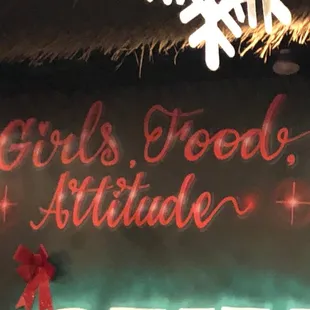 a neon sign for a taco restaurant