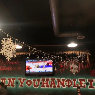 people sitting at tables in a restaurant