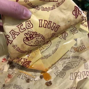 Grease dripping through the wrappers.