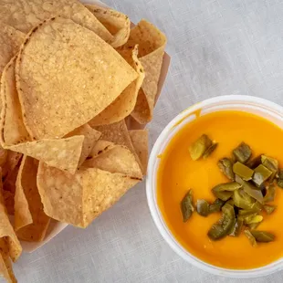 nacho chips and a bowl of soup