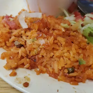 Parrilada old rice super salty meat.