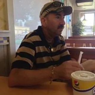 Adam L.
