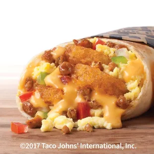 a burrito with eggs, sausage, and cheese