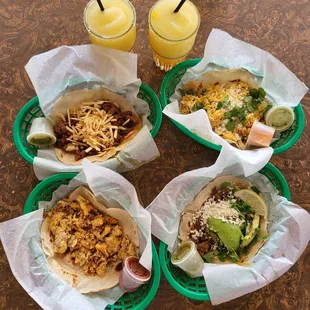 a variety of tacos and drinks