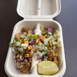 1 Taco Carnitas and 1 taco chorizo