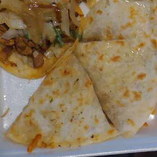 Pastor taco and carnitas quesadillas