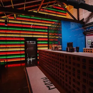 a brightly lit bar with colorful walls