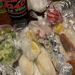 a sandwich, salad, and a drink