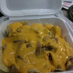 Chile verde nachos without Jalapenos.