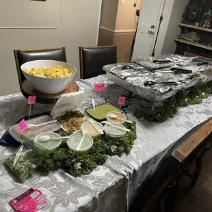 Self serve taco bar that Taco Lady's team set up for us. So delicious! Everything was kept warm the whole night.