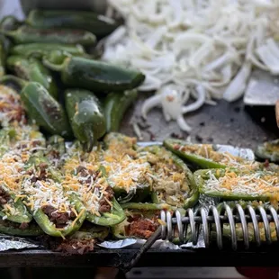 Poppers are included it with the deluxe package