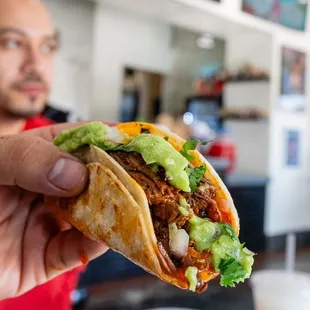 Birria tacos are fire my friend love it and I have chilaquiles burrito great service  Thank you taco land will be back soon