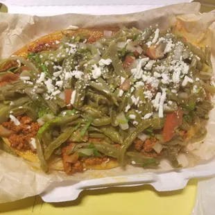 Huarache with chorizo and nopales.