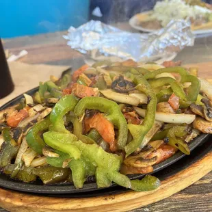 a plate of vegetables on a table
