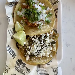 Shredded chicken street taco and vegetarian street taco