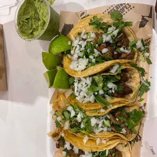 Beef tacos and a side of guacamole