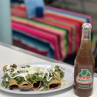 a bottle and a plate of food