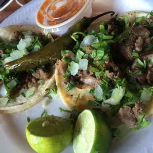 Steak (left) and tongue (right) tacos:) The tongue is so juicy it reminds me of pot roast kind of.