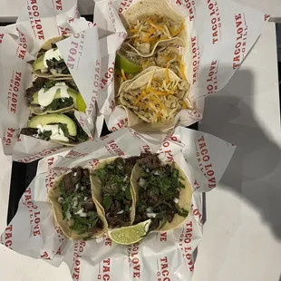 three tacoss on a table