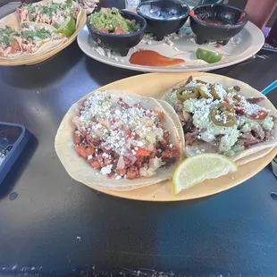 i order one Slayer on the (right) it was really really spicy, to the left its carnitas taco not a big fan of the pineapple but i took it off