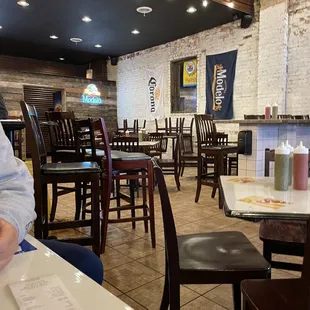 a man sitting at a table in a restaurant