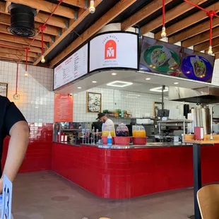 a man standing in front of a counter