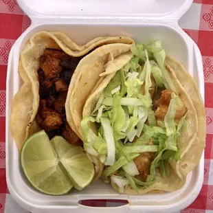 Fish taco ($3) and pastor taco ($2.50) - delicious!