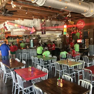 Looking toward the front kitchen area across the dining area