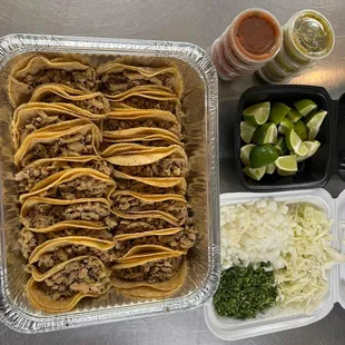 20 Chicken street tacos with toppings $25