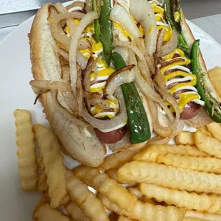Two bacon wrapped dogs with fries