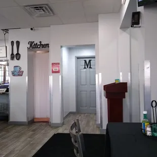 Door to Men's Restroom