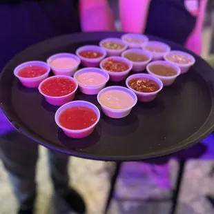 a tray of condiments