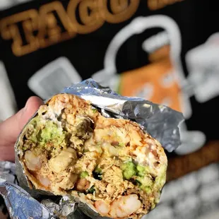 The World Famous Three Meat Burrito only at Taco Mell Catering