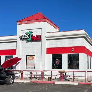 a car parked in front of a taco mex