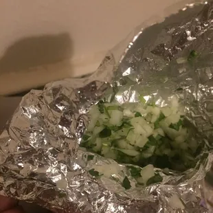 Onions and cilantro   I should've got some lettuce  and tomato
